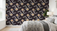 Restful bedroom backdrop finished in charcoal botanicals with light leafy detail