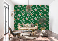 Sunlit corner seating framed by Scandi botanical wallpaper in a deep green tone