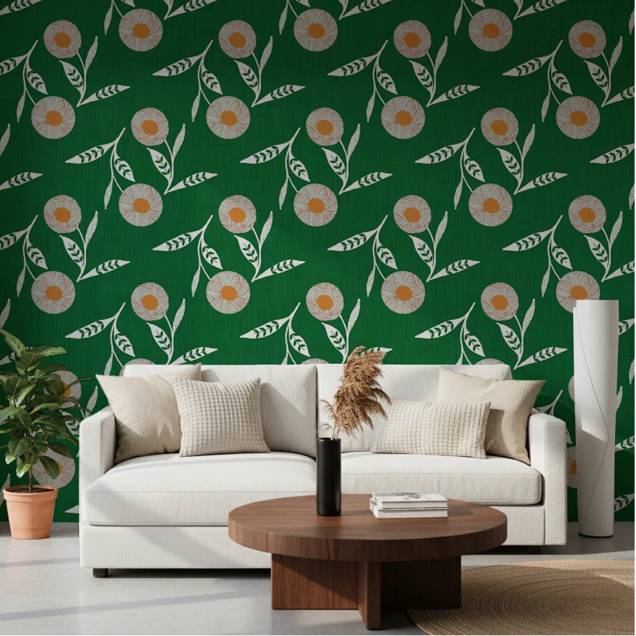 Living room grounded by forest green floral wallpaper with crisp white leaves and blooms