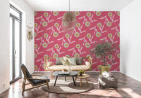 Sunlit lounge corner with playful flower motifs across a rose clay feature, GD8619