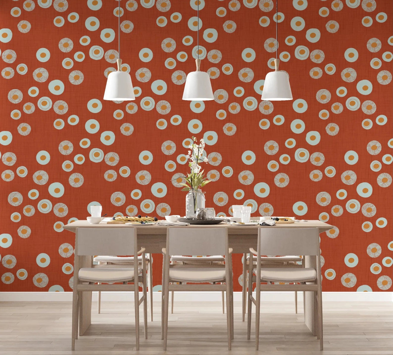 Dining area warmed by burnt terracotta circle wallpaper with playful folk-inspired dots