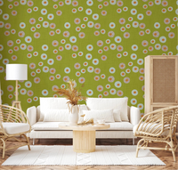 Woven seating and soft light pair beautifully with this olive chartreuse lounge wallpaper, GD8600