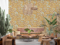 Warm dining room styled with Cozy Scandi Folk Floral Honey Mustard wallpaper, GD8549