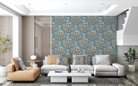 Sunlit sofa area styled in Cozy Scandi Folk Floral Nordic Blue Grey wallpaper, GD8553