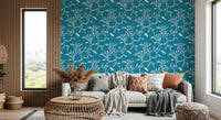 Warm sofa corner updated with Cozy Scandi Folk Leaf Vine Nordic Teal wallpaper, GD8540