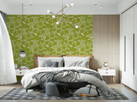 Bedroom space framed by Cozy Scandi Folk Leaf Vine Olive Chartreuse wallpaper, GD8541