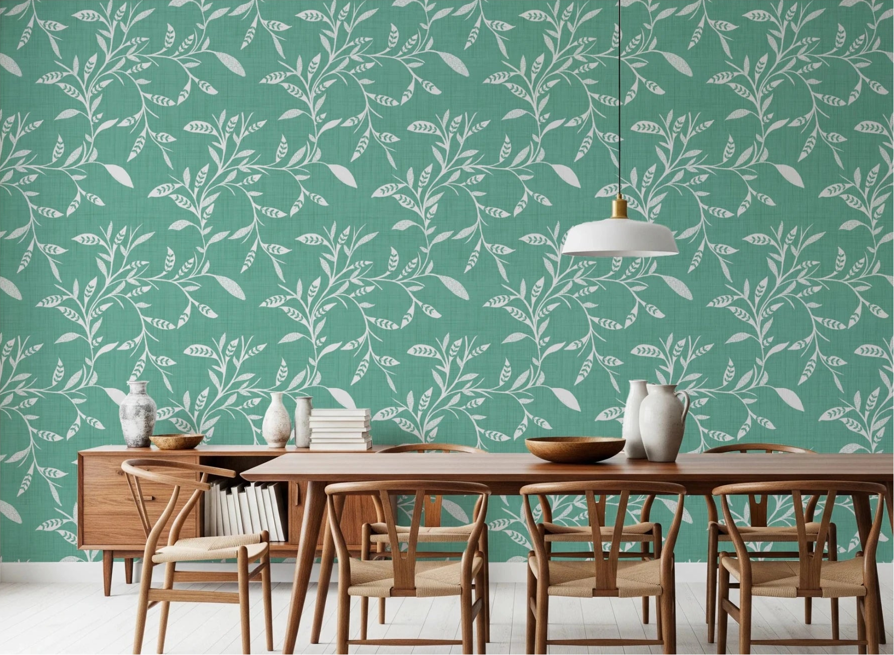 Dining room styled with Cozy Scandi Folk Leaf Vine Sage Mint wallpaper and wood seating, GD8544