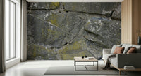 Angled view of a textured stone wallpaper mural.