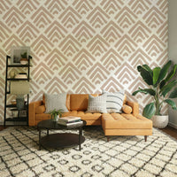 An angled shot of a wall with a detailed wallpaper

