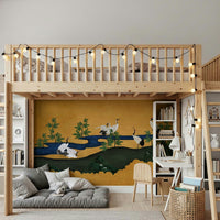 Contemporary lounge area showing Crane Haven wallpaper behind a sofa.