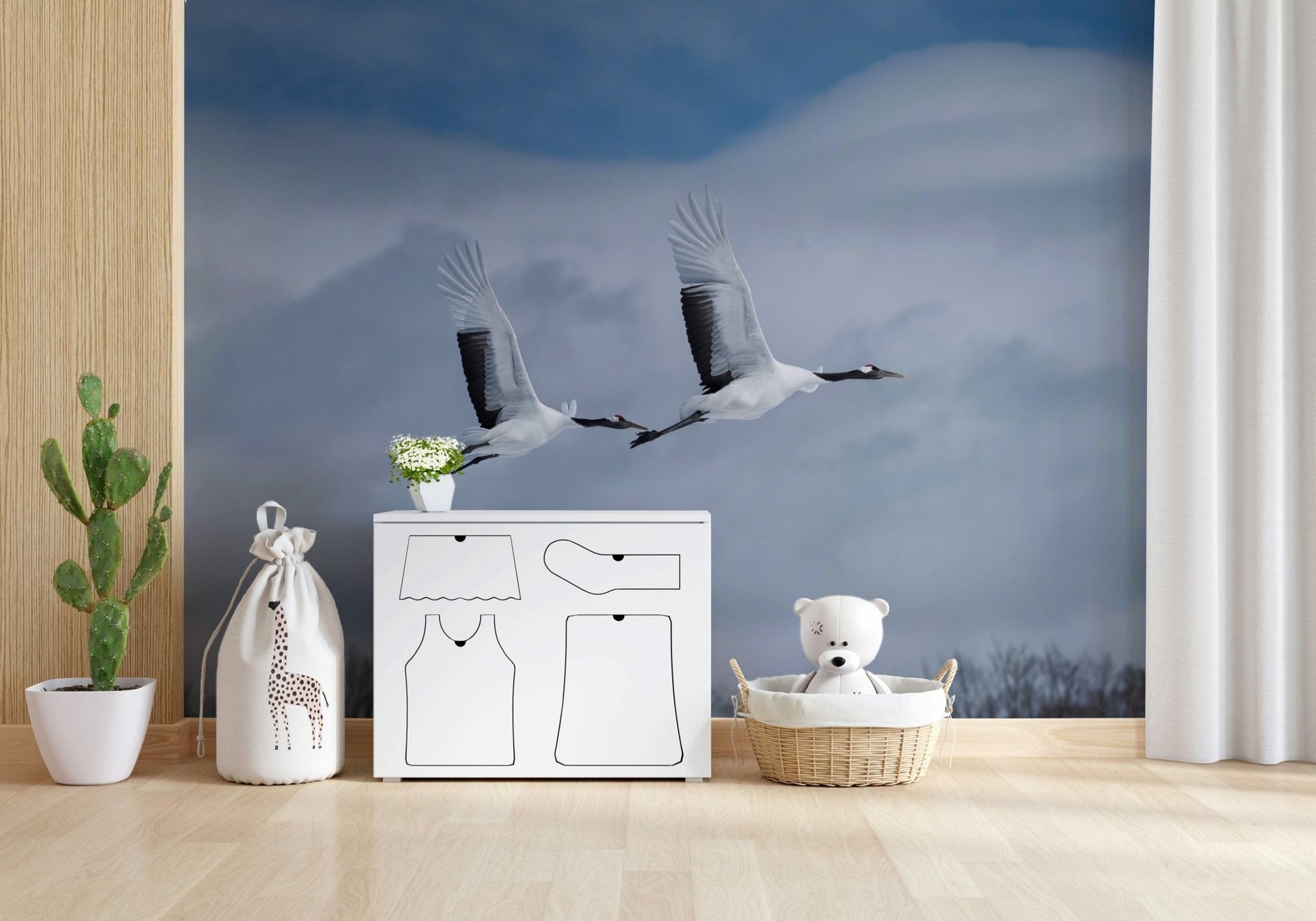 Large scale bird wallpaper for an open plan apartment living space.