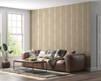 Vertical lines drop neatly down the lounge with Creamy White Stripe Beige wallpaper.⁠GD9611