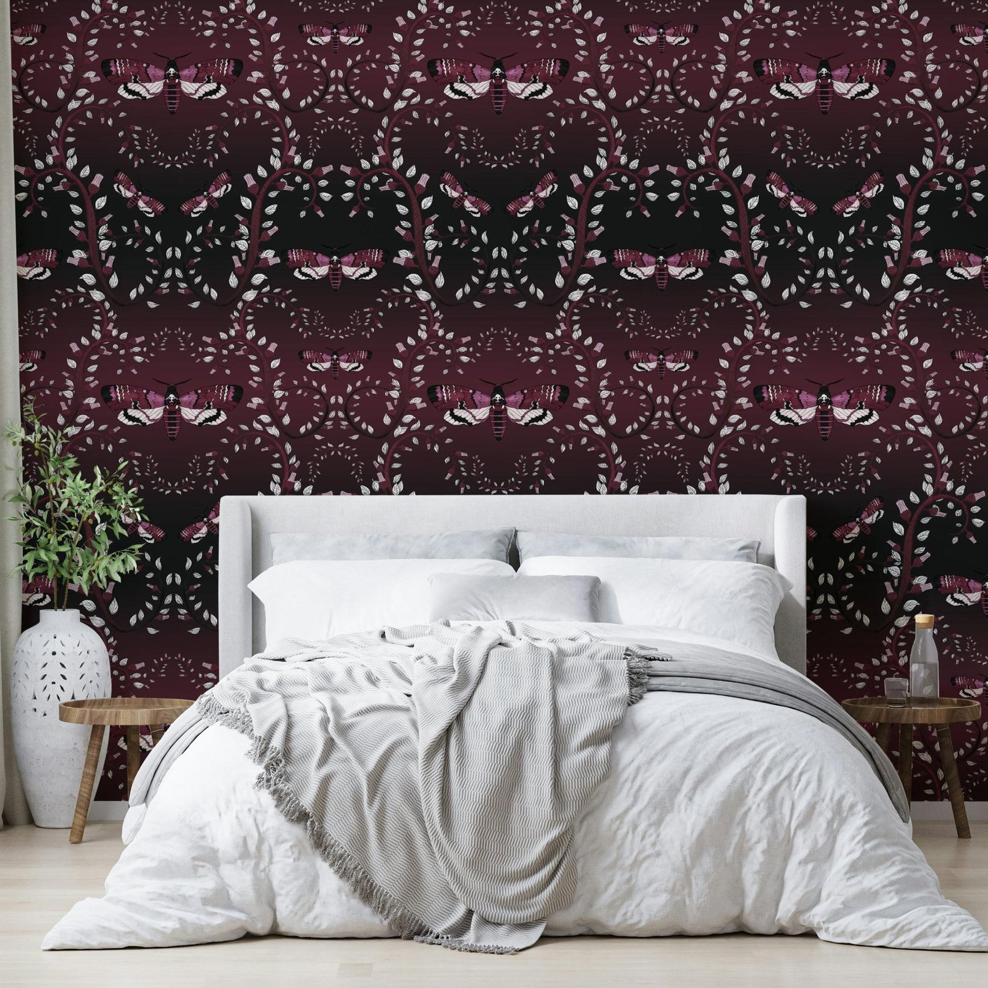 Nature-inspired wallpaper with dramatic red tones and moths.

