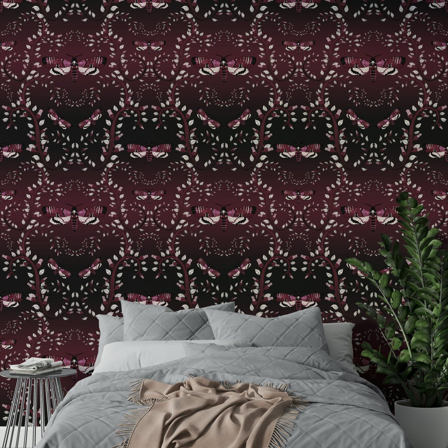 Dramatic moth-themed wallpaper in rich crimson hues.

