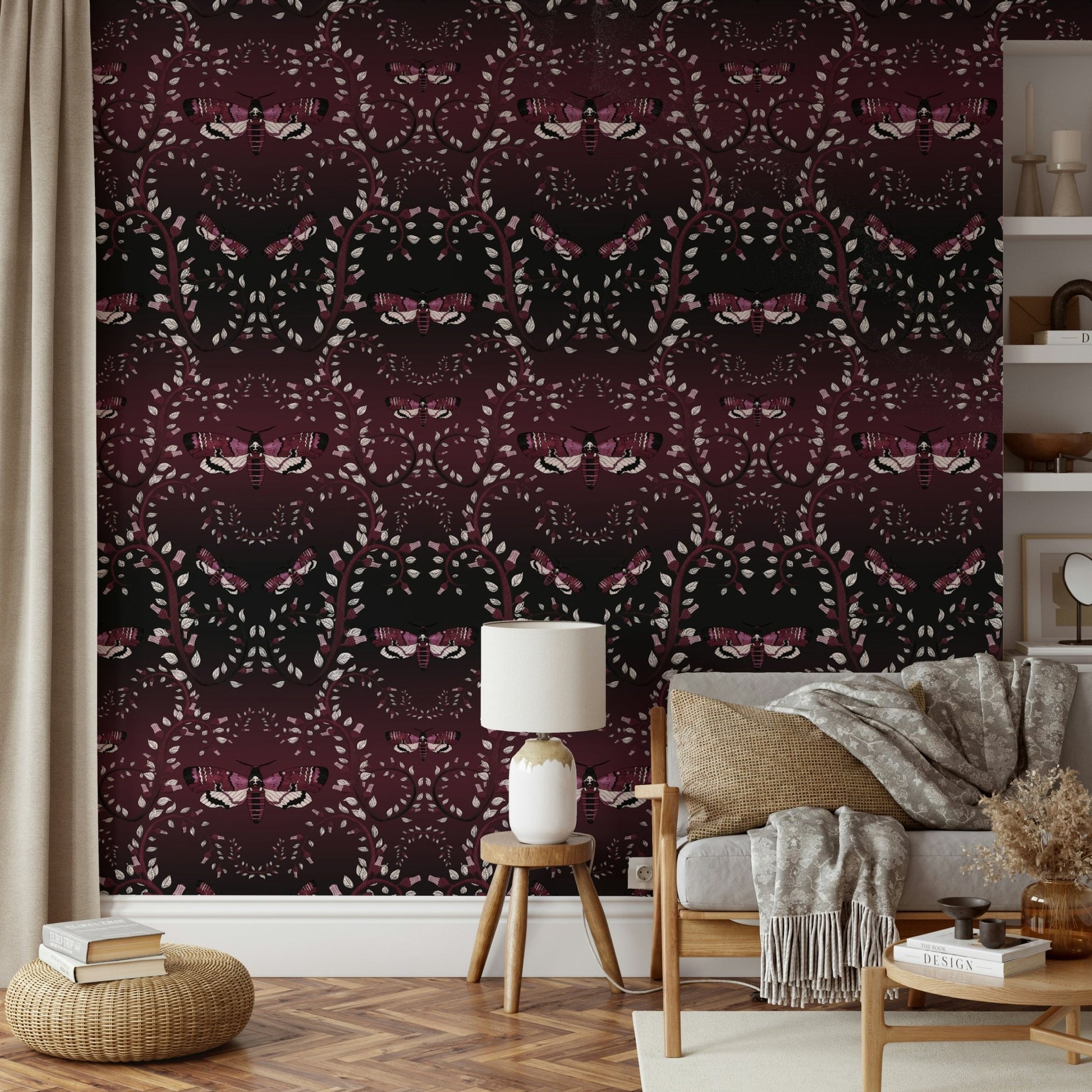 Bold red wallpaper with hand-drawn moths in motion.

