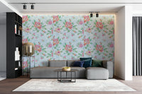 The primary color is blue, likely complemented by other soft or muted tones for the blossoms.
