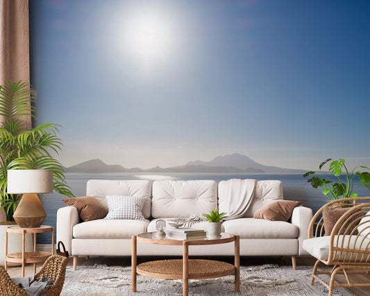 Living room with Crystal Blue Morning Wall Mural behind a white sofa