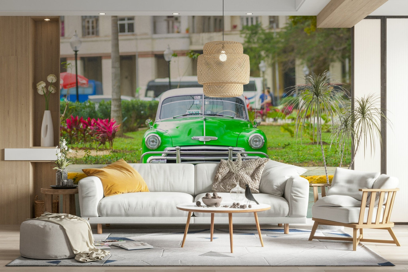 A wall mural of a classic car in Cuba.

