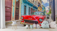 Sunset over the ocean with a Cuban cruise mural.

