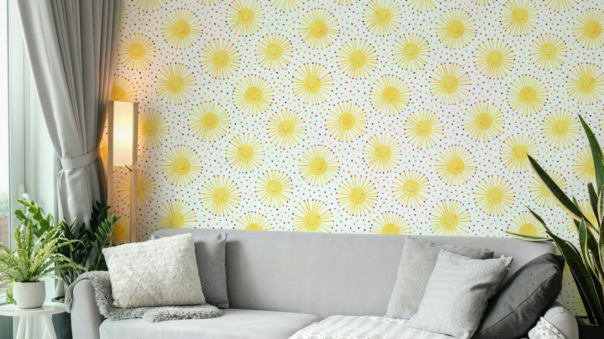 Cheerful sun faces wall mural in nursery

