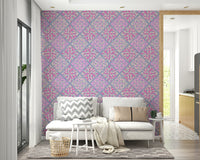 The peel and stick wallpaper on a smooth wall surface.