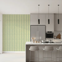 Daisy Chain Delight Wallpaper brings gentle vintage patterning to a modern kitchen