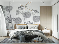 Bedroom interior with bed placed against Dancing Wildflowers Wall Mural scene