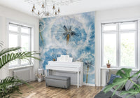 Designer meadow pattern Dandelion Dreams Wall Mural installed behind a reading chair.