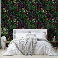 Dark floral and leaf wallpaper.
