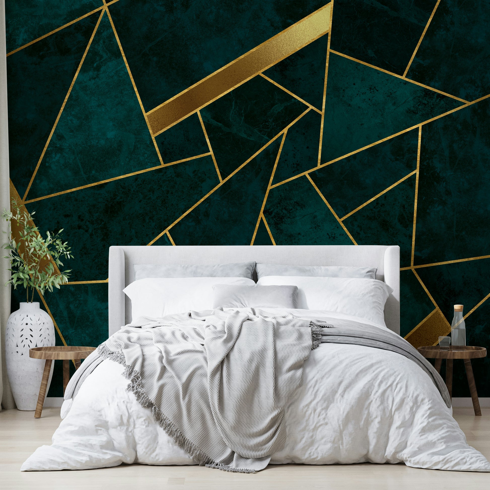 Dark teal background with gold mosaic pattern on walls.