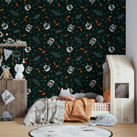 A party room decorated with a Halloween mural

