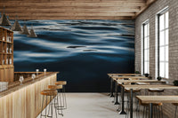 Tranquil blue wallpaper for walls behind a white desk.
