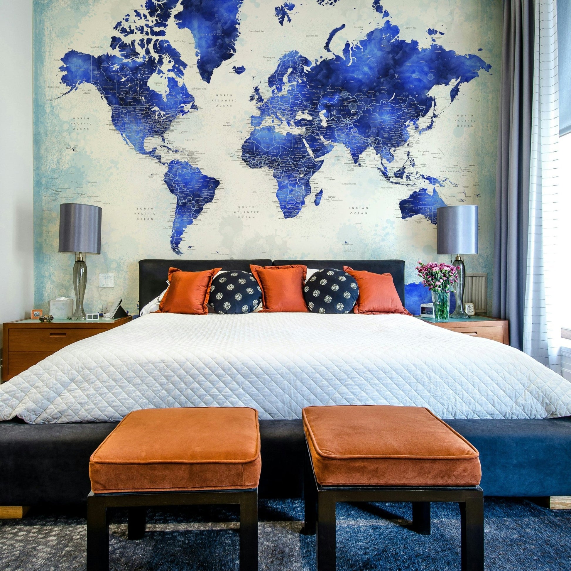 Artistic watercolor atlas wall mural with faded indigo continents