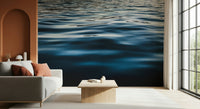 Bedroom feature wall with the serene Deep Blue Waters peel and stick wallpaper.