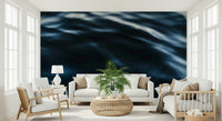 Sofa against the Deep Blue Waves wallpaper mural.