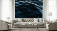 Deep blue and white foam on wave wallpaper.