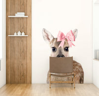 Serene deer with bow wall mural for a calming space

