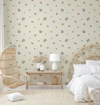 Delicate watercolor floral wallpaper in soft hues

