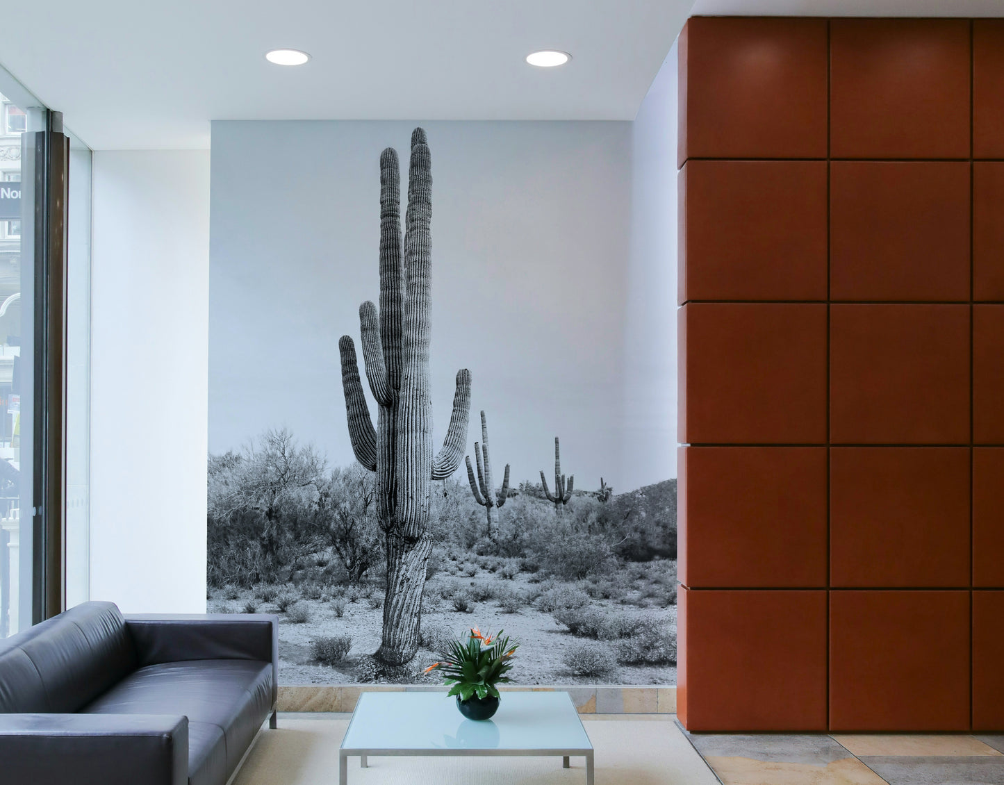 Monochrome cactus mural for desert-themed interiors.

