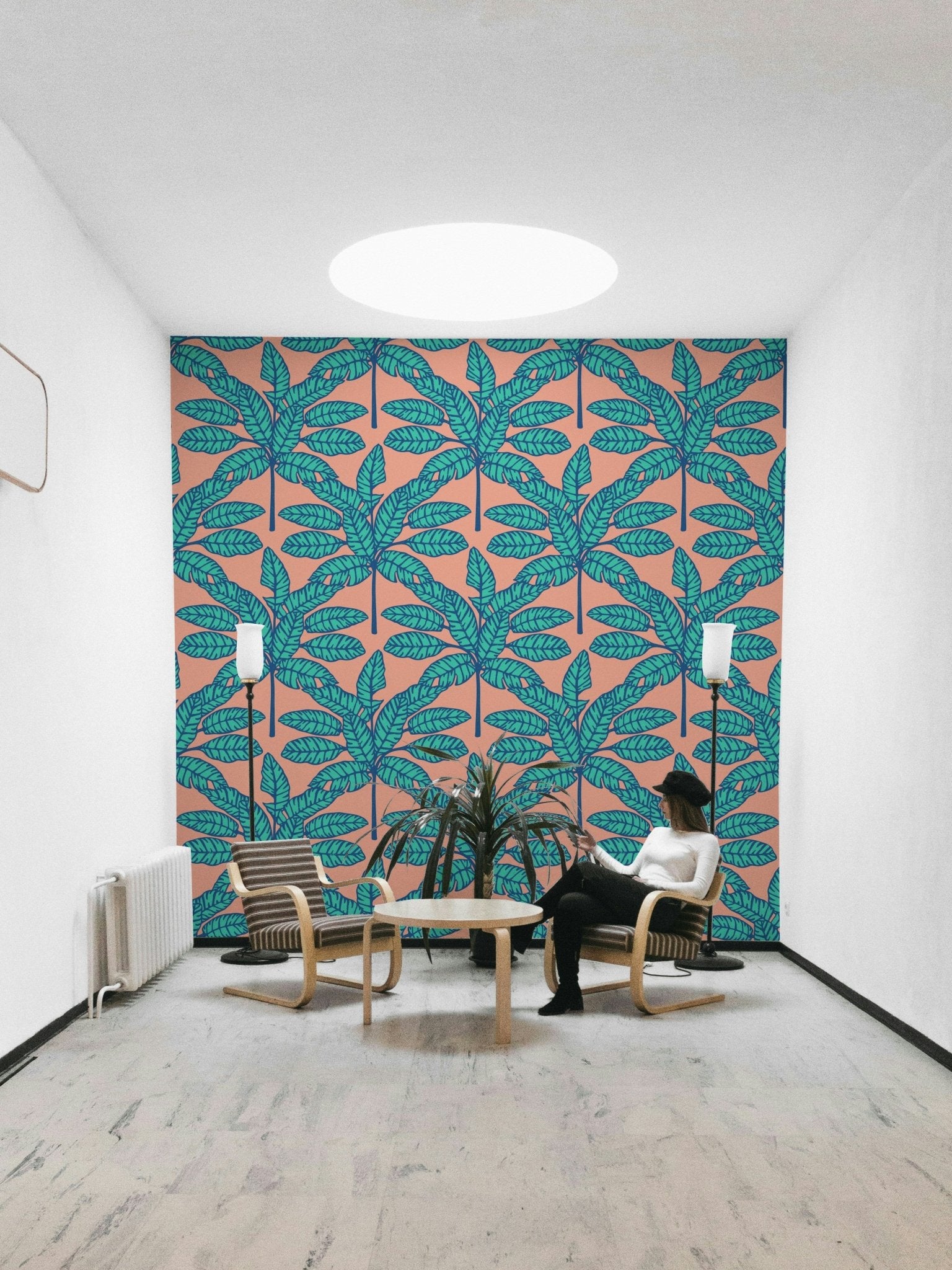 Aqua blue and pink desert leaves wallpaper for modern spaces.

