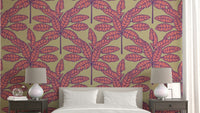 Pink and purple tropical leaf design on cream background wallpaper


