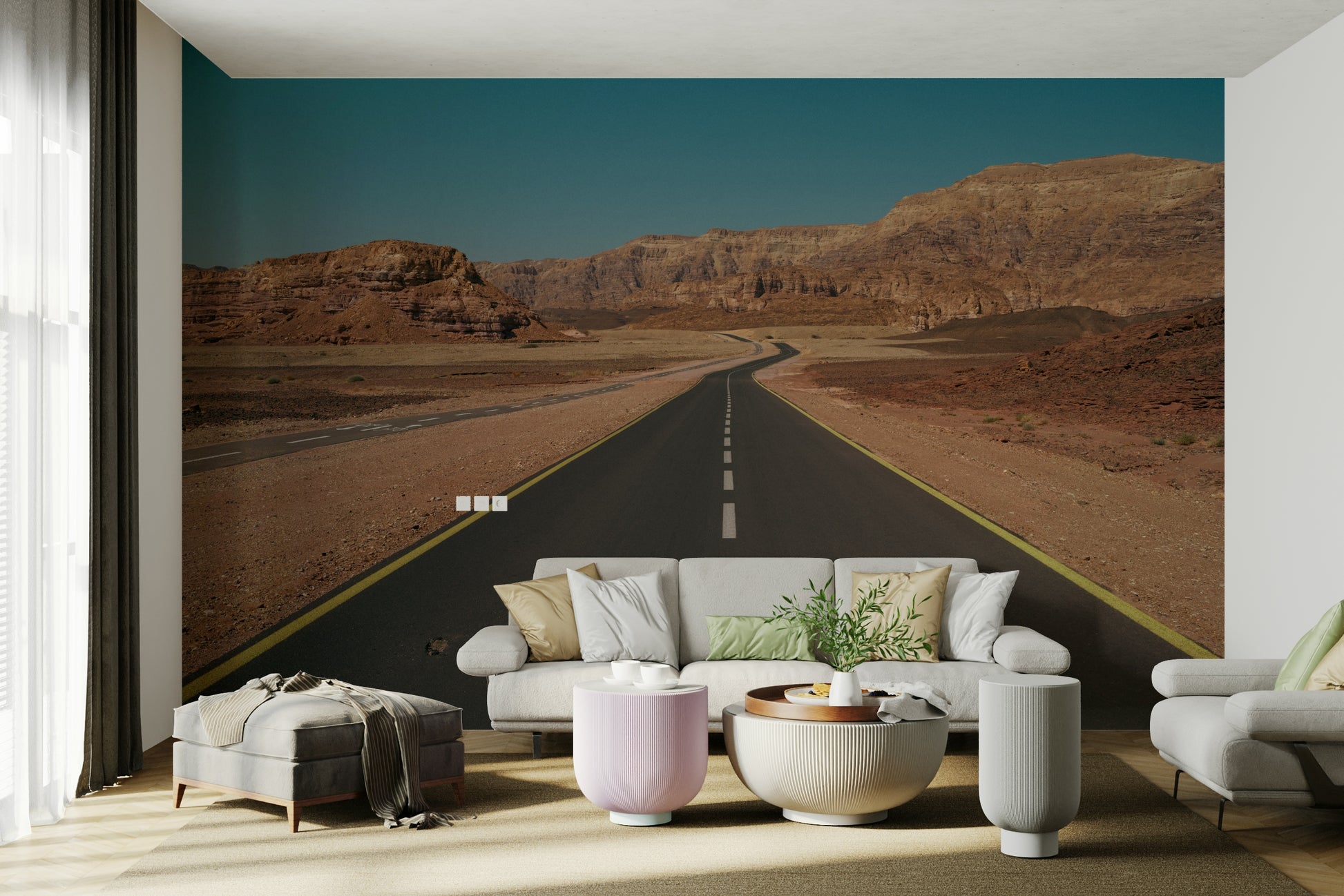 A living room featuring the desert road wall mural.