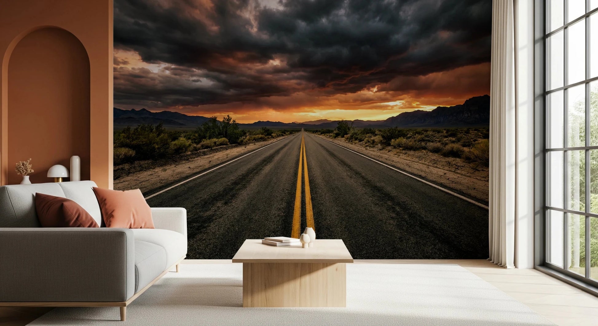 Scenic dusk wall mural featuring an empty highway through a dry desert landscape