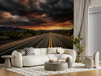 Hallway featuring Dusk Wall Mural with an open desert road and stormy sky