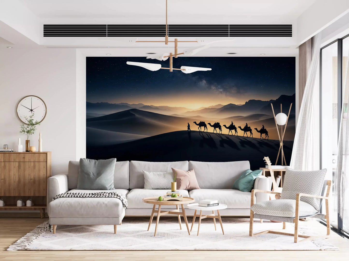 A line of camels and riders crosses the top of a dune on this desert wall mural
GD9566