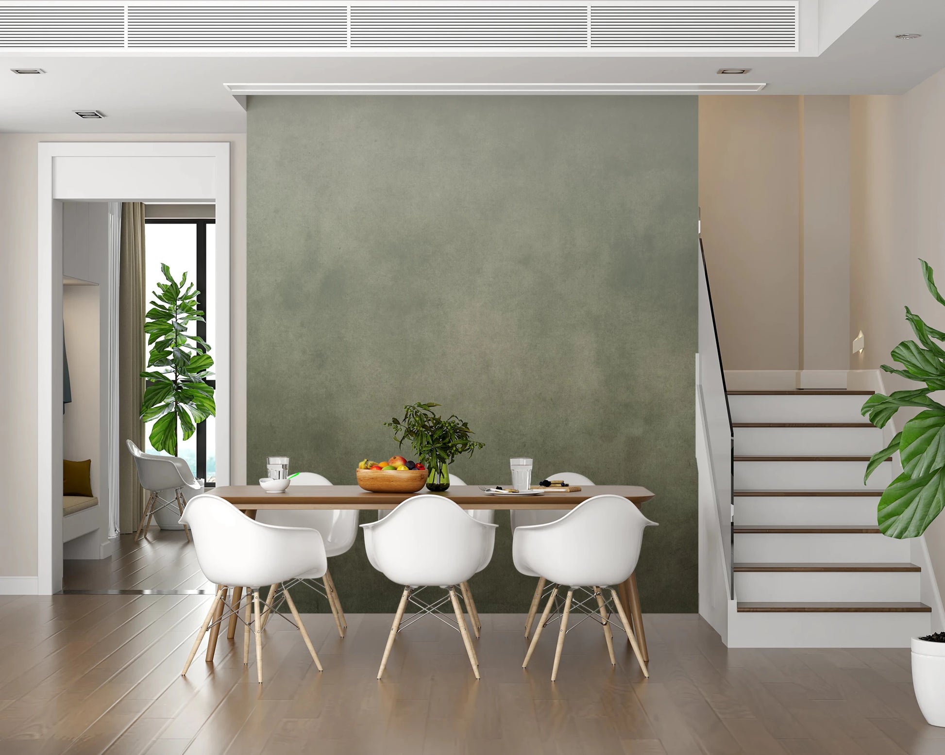 The dining space picks up warmth from Dirty Paper Ombre Sage Wall Mural tones