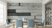 Accent wall showcasing the farmhouse-style distressed wood wallpaper mural.