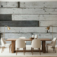 Accent wall showcasing the farmhouse-style distressed wood wallpaper mural.