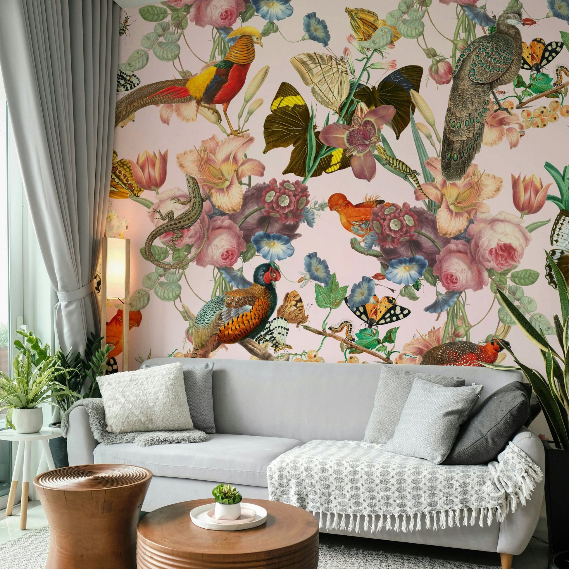 Soft blush pink background with vibrant floral mural design

