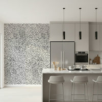 Modern nursery showcasing the Dotted Delight wallpaper for walls.